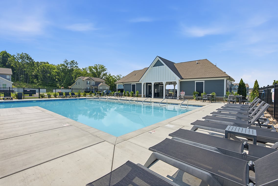 A swimming pool in a backyard.