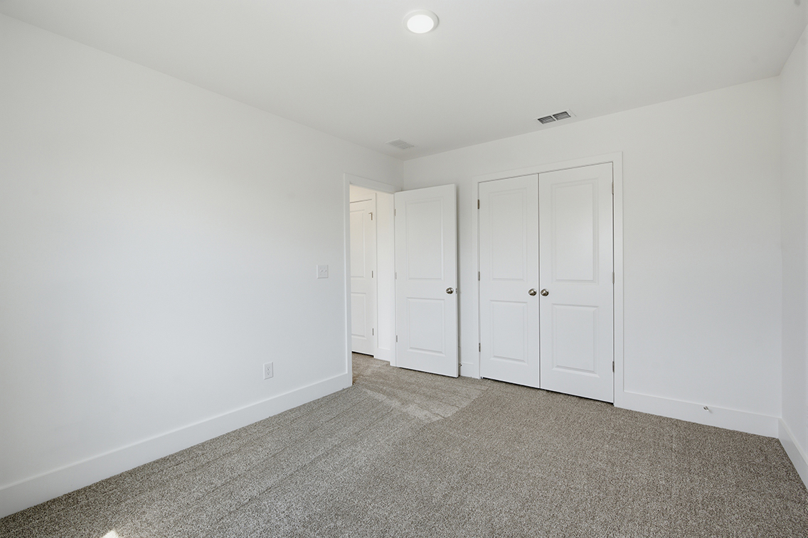 A room with white doors.