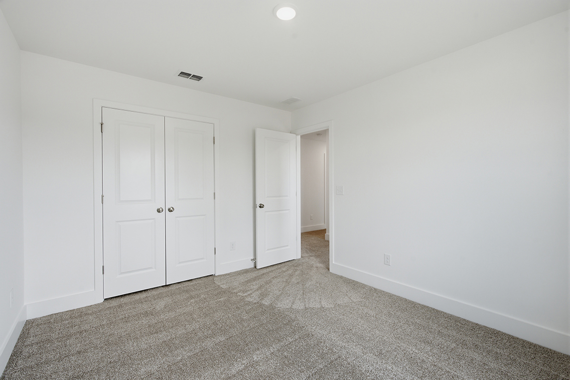 A room with white doors.