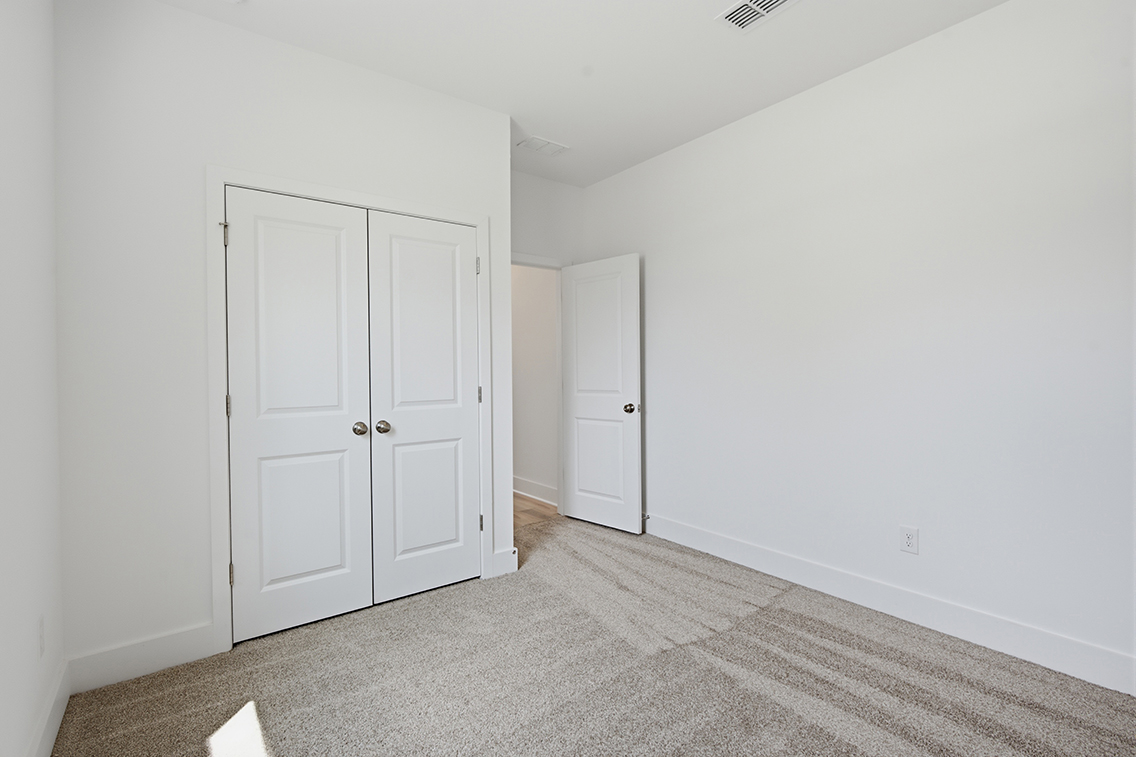 A room with white doors.