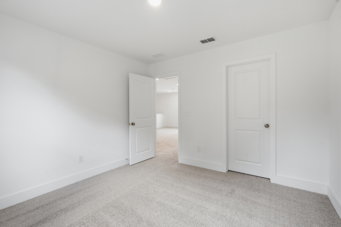 A room with white doors.