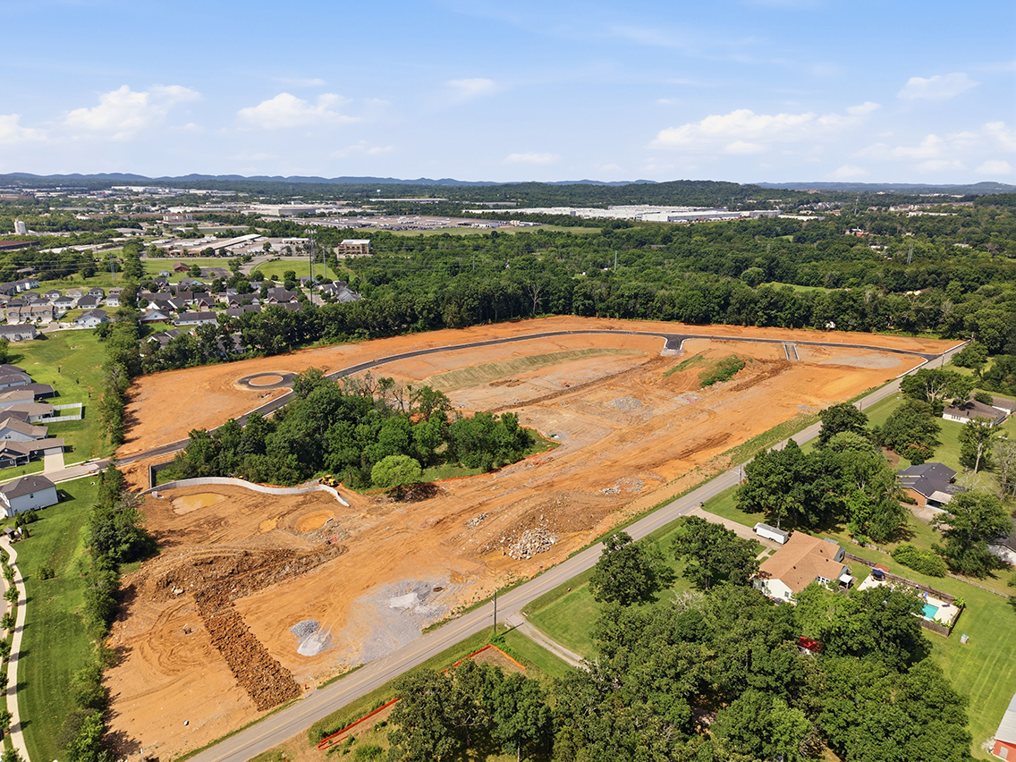 A landscape with trees and buildings.