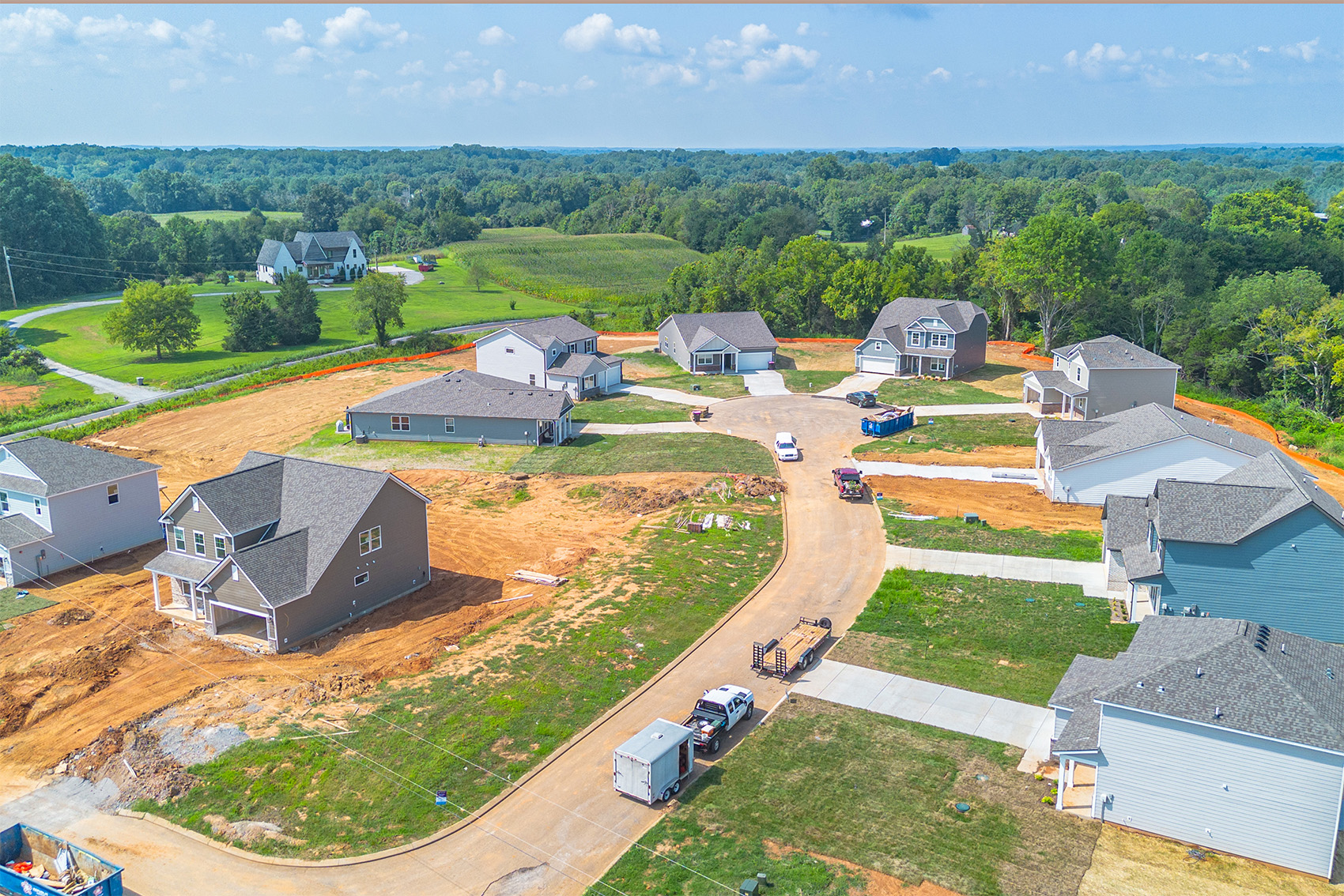 A group of houses and trees.