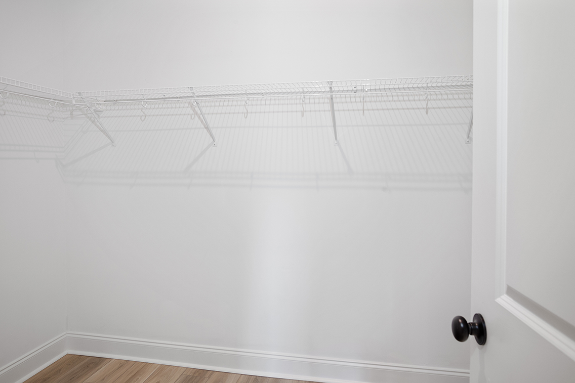 A white door with a black handle.