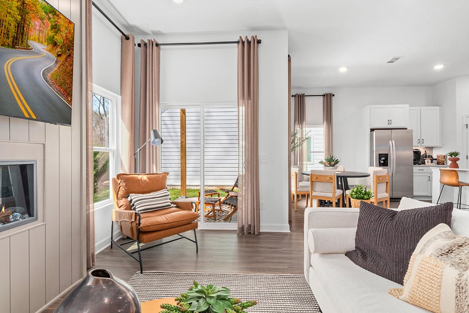 A living room with a large window.