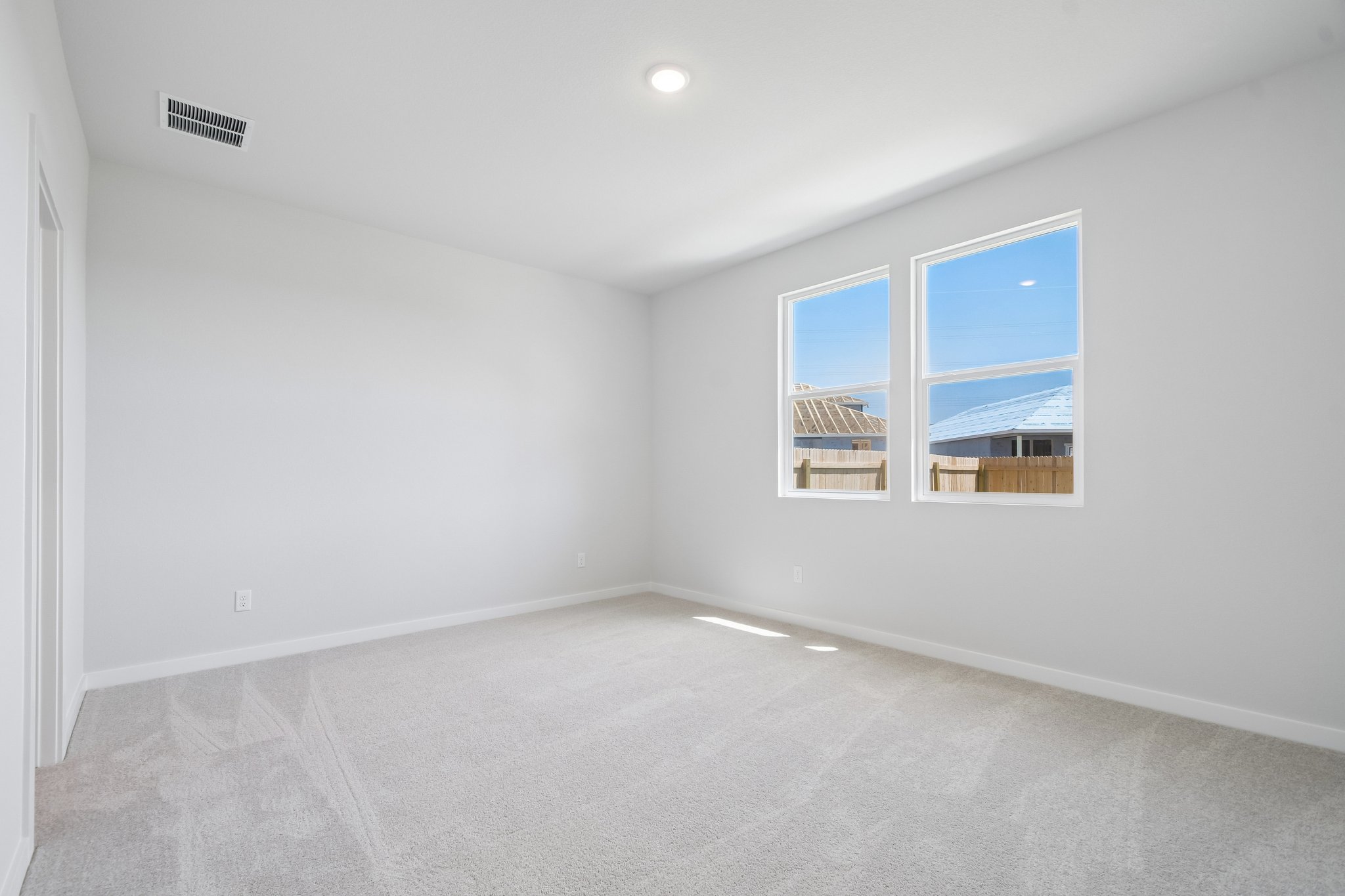 A room with a large window.