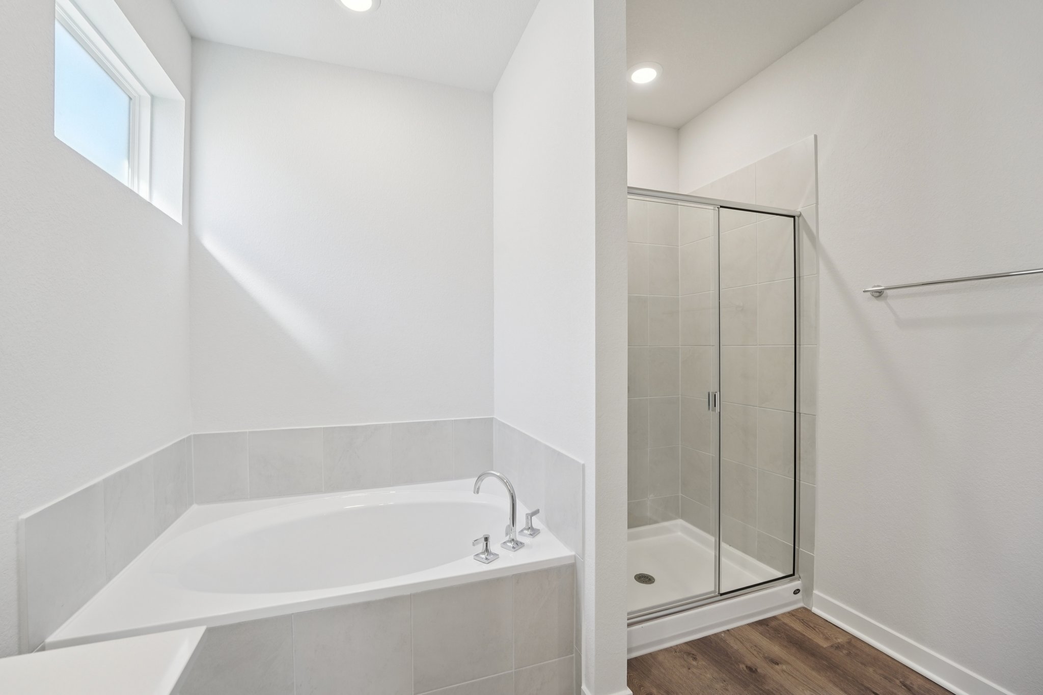 A bathroom with a glass shower.