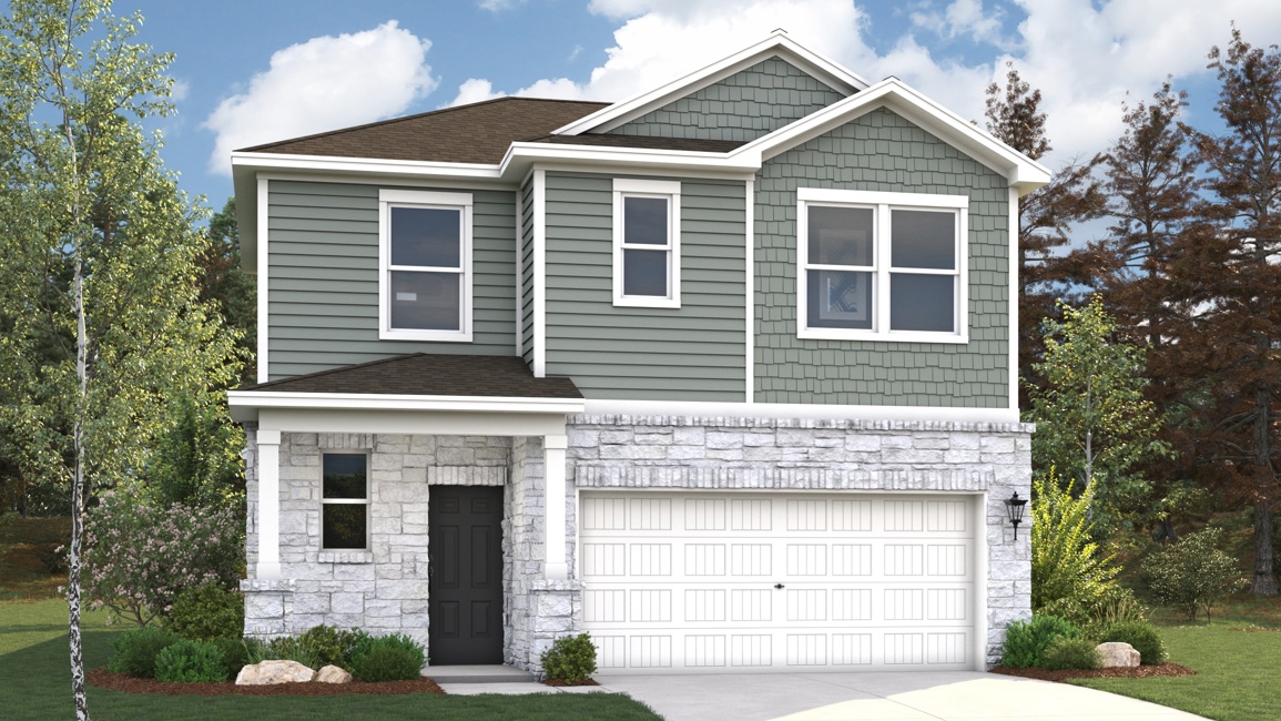 A white house with a garage.