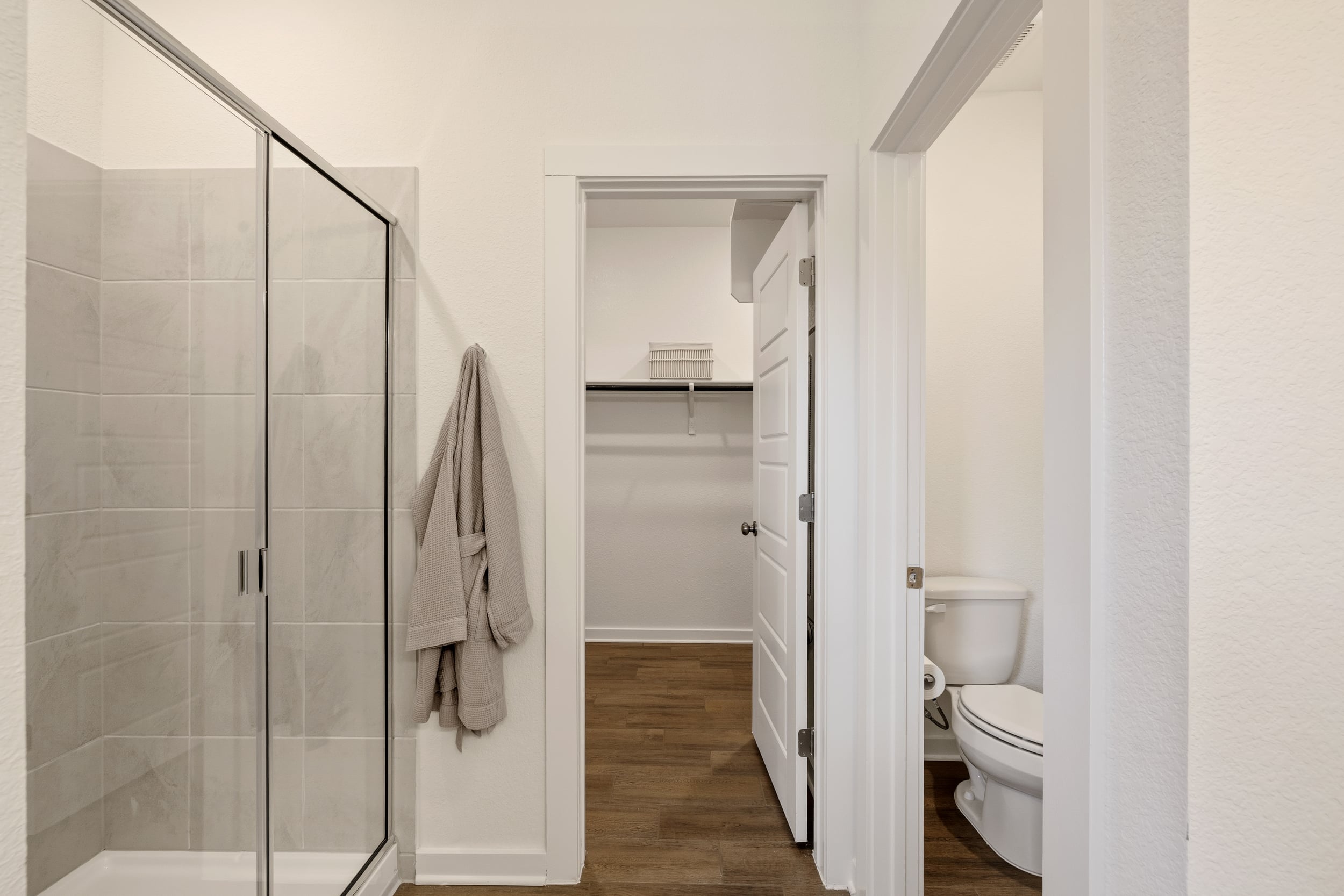A bathroom with a glass shower.