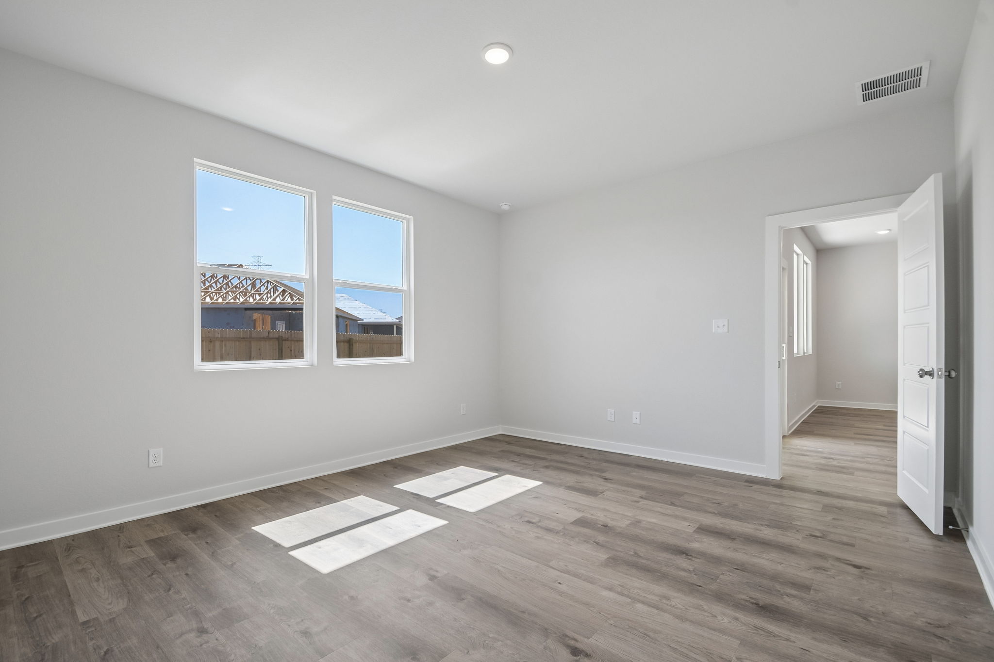 A room with a large window.