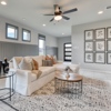 Hamilton plan has lots of natural light in great room for Eastwood at Sonterra in Jarrell, TX by Century Communities