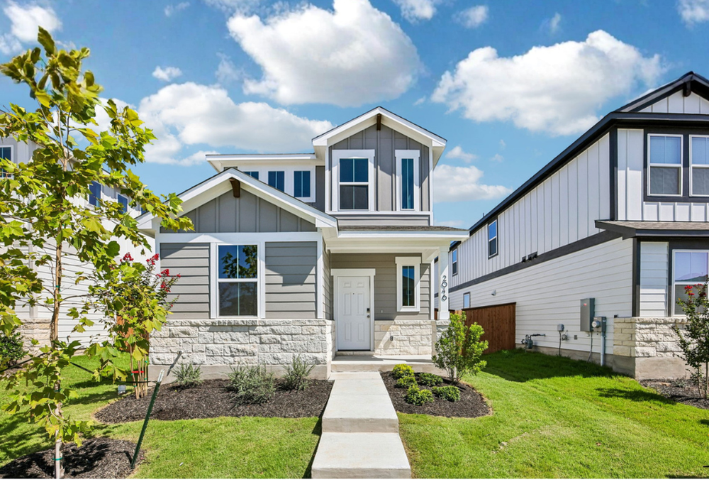 A house with a front yard.