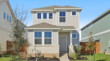 A house with a front yard.