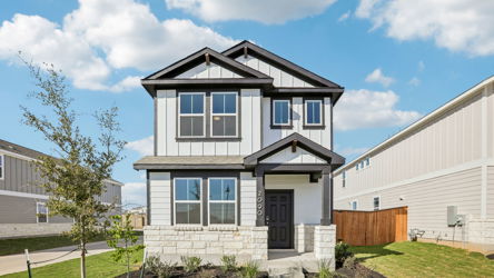 A house with a fence around it.