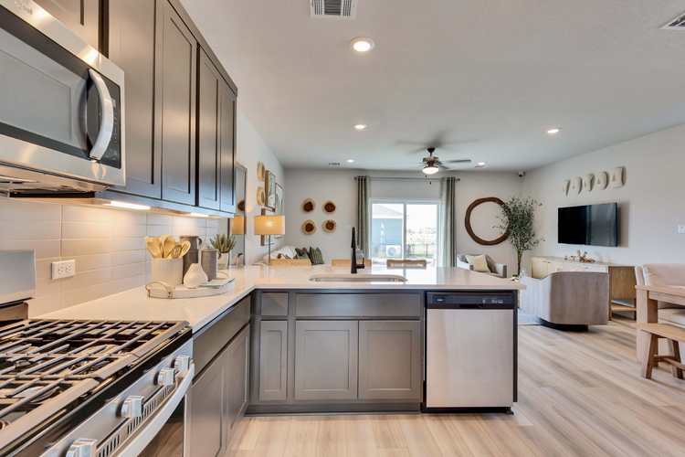 A kitchen with a stove and oven.