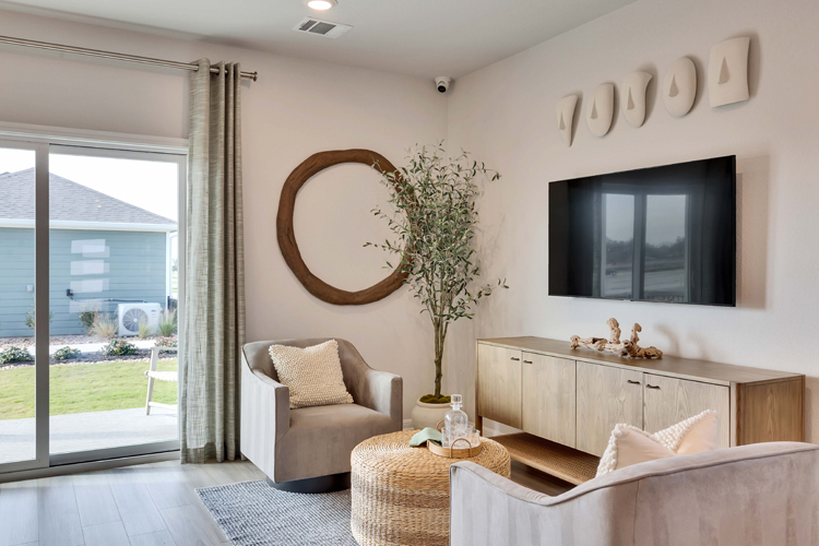 A living room with a large mirror.