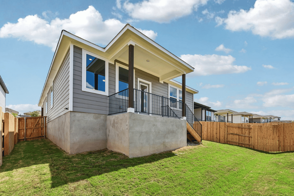 A house with a fence around it.