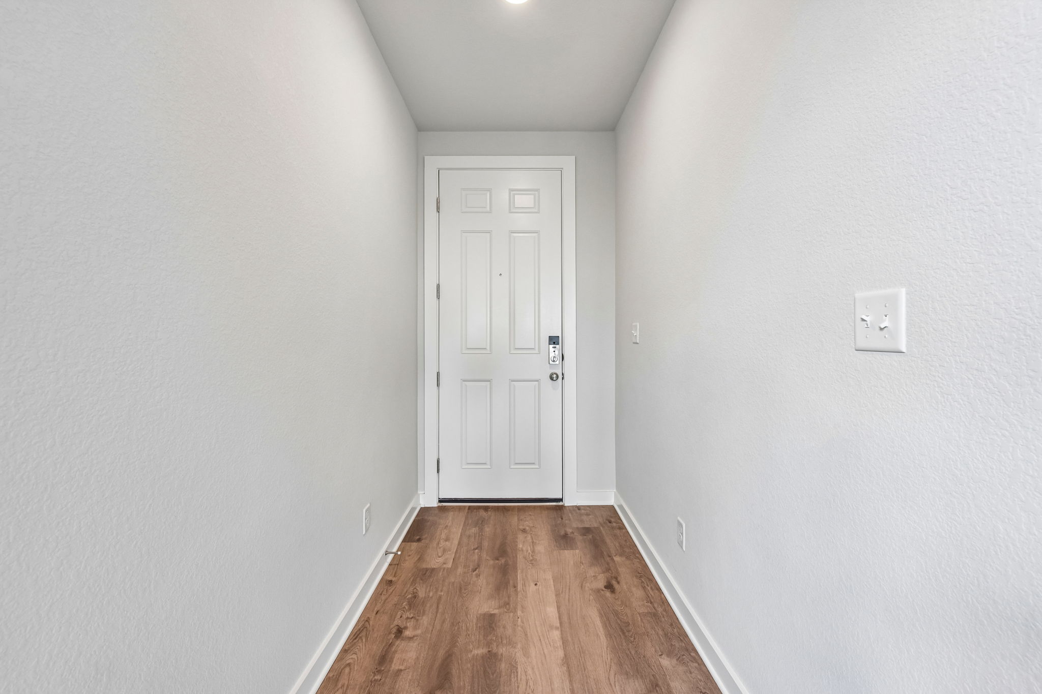 A white door in a room.