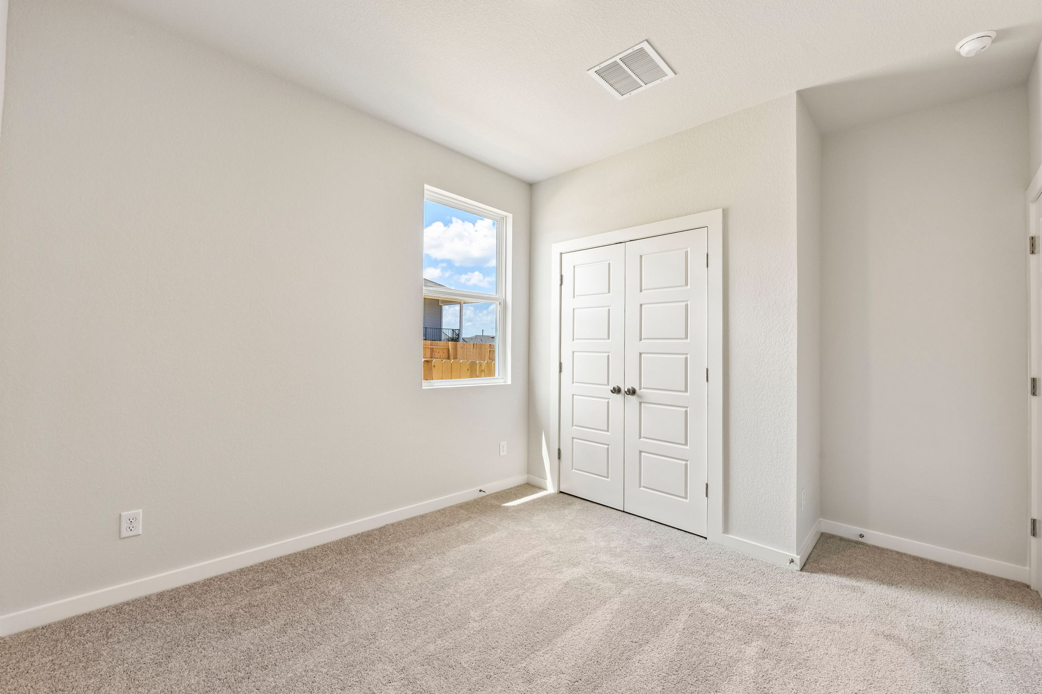 A room with white doors.