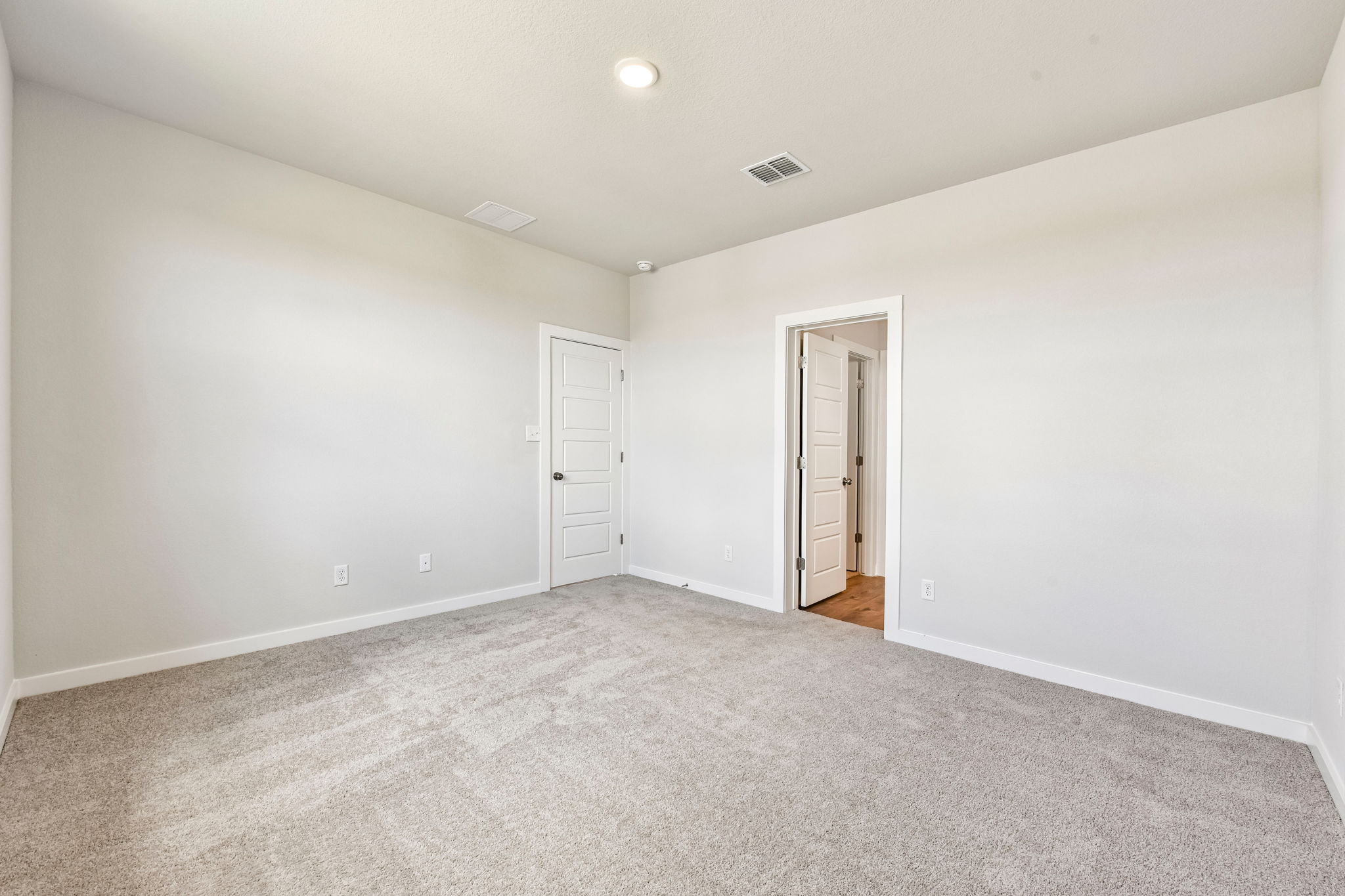 A room with white walls.