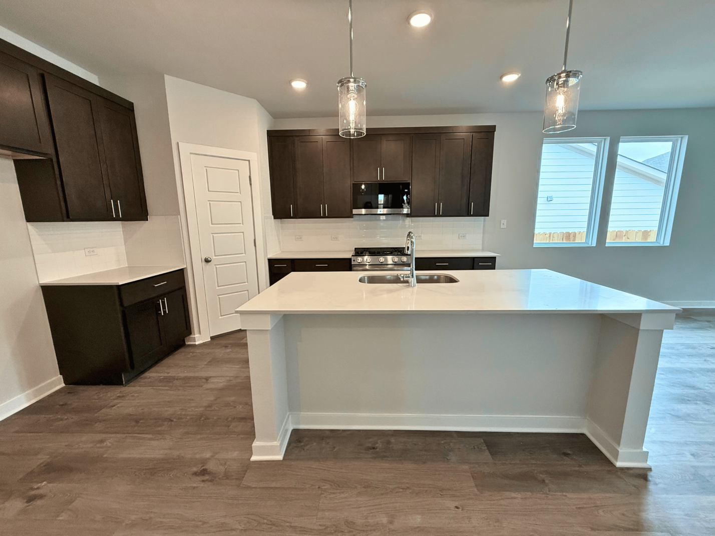 A kitchen with a large island.