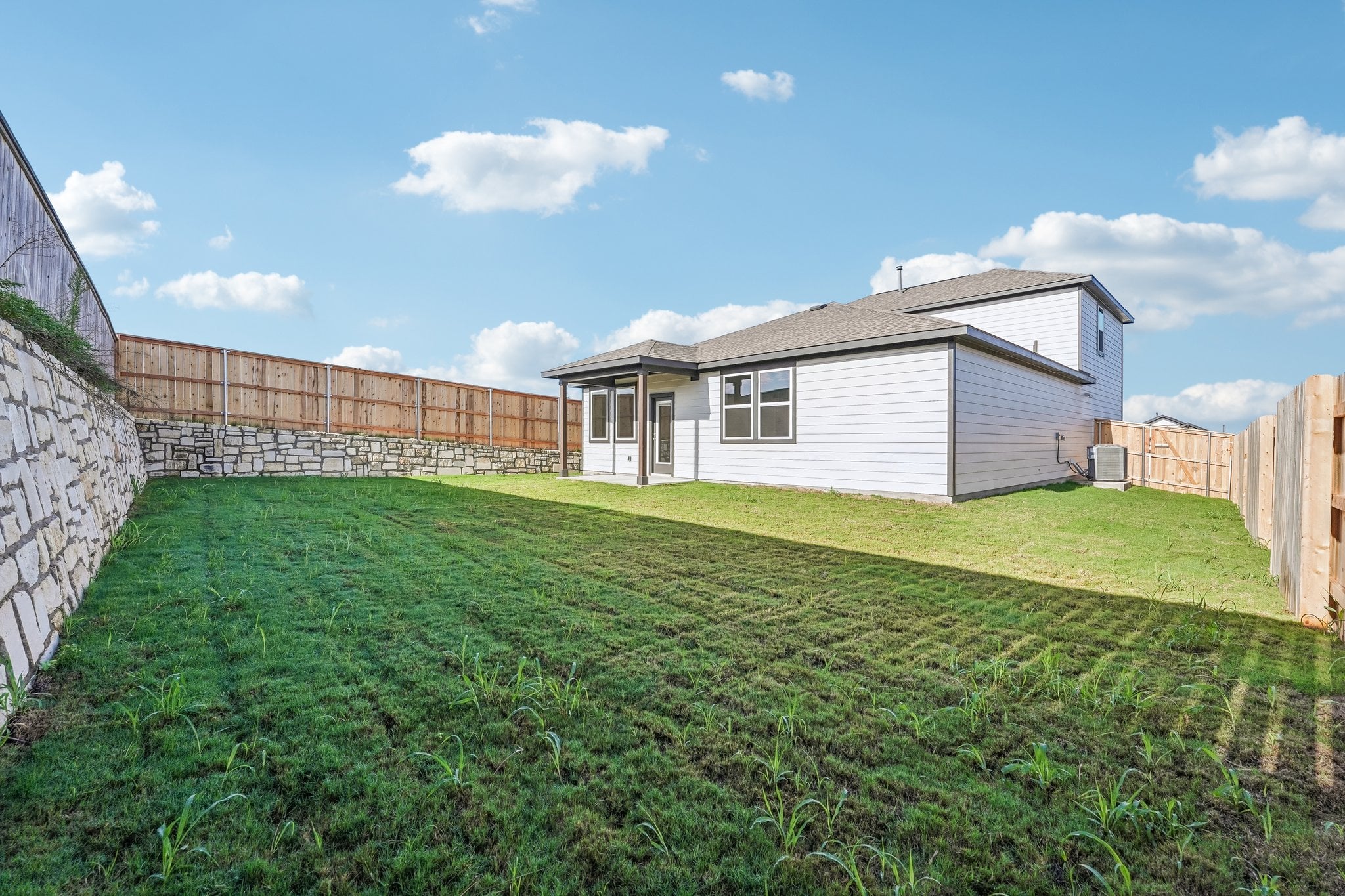 A house with a fence around it.