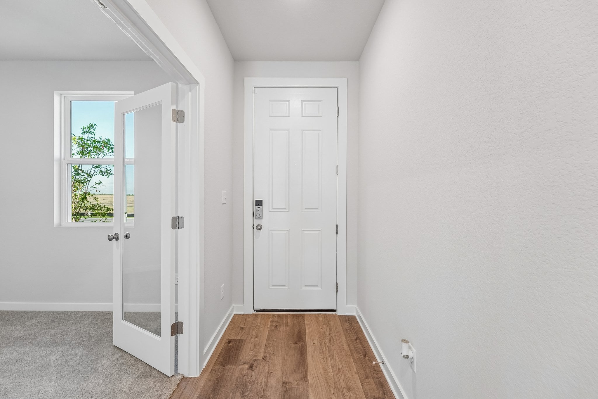 A room with white doors.