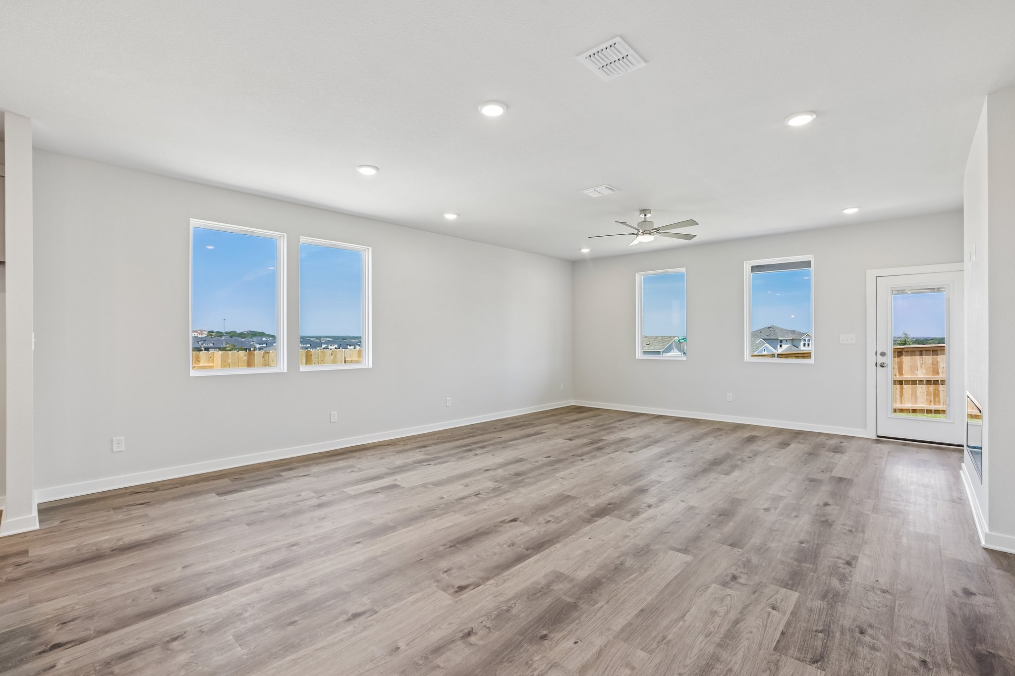 A room with a wood floor and a wood floor with a wood floor.