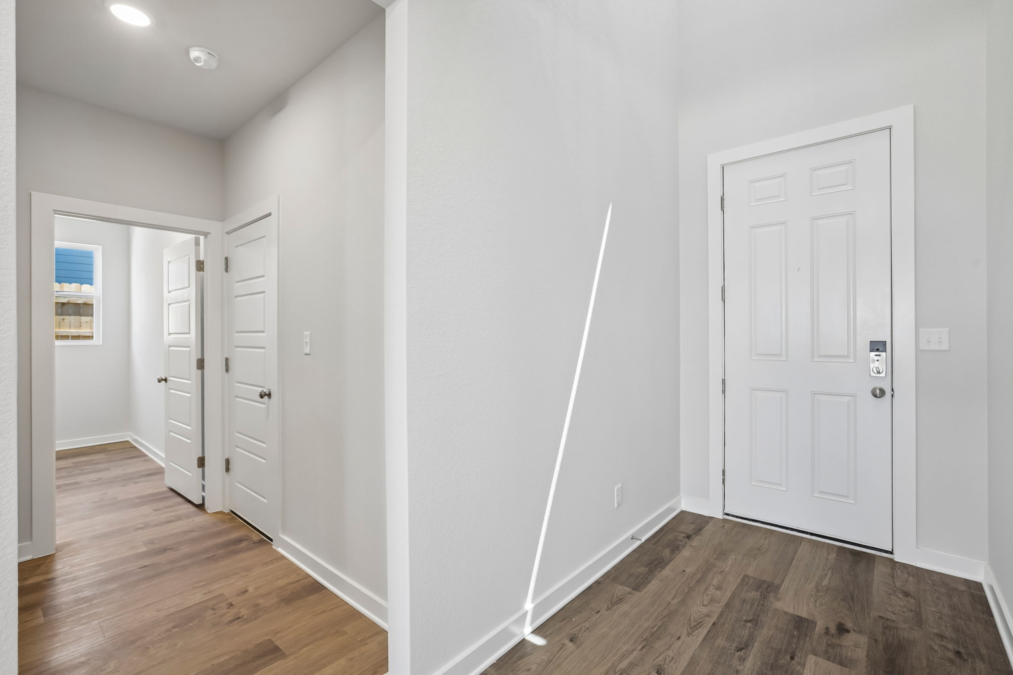 A room with white doors.