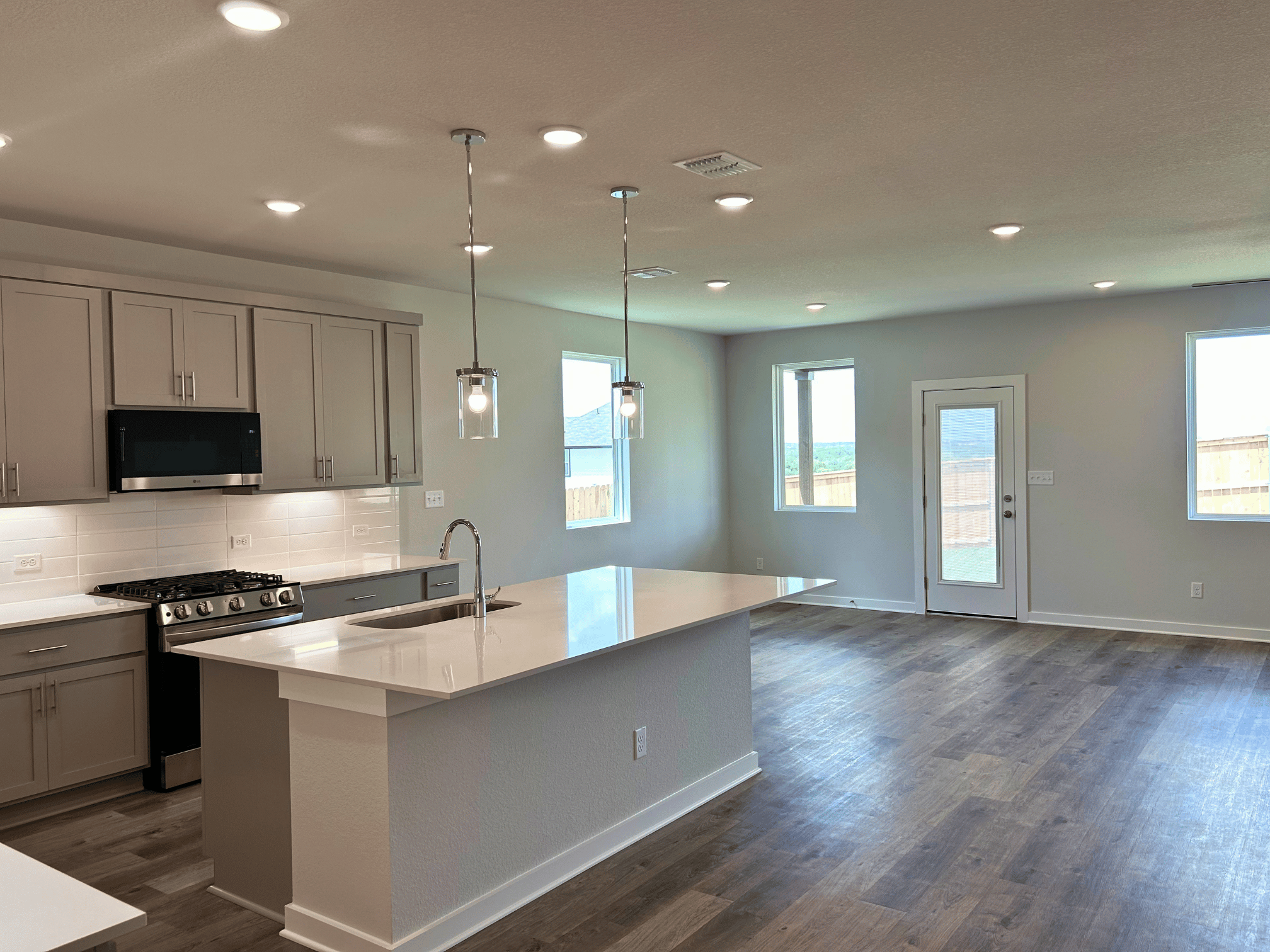 A kitchen with a large island.