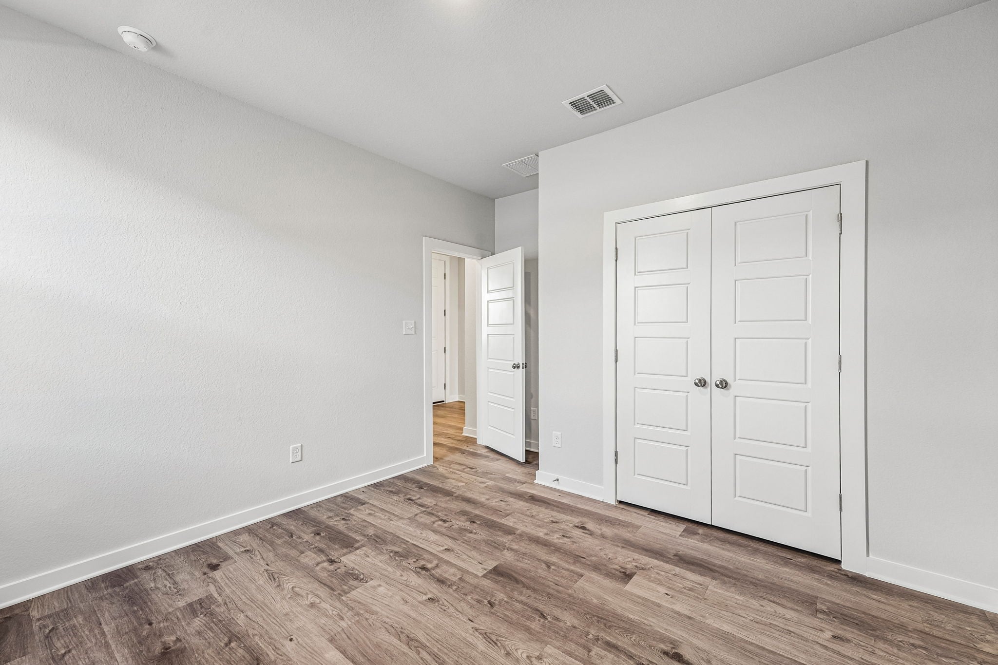 A room with white doors.