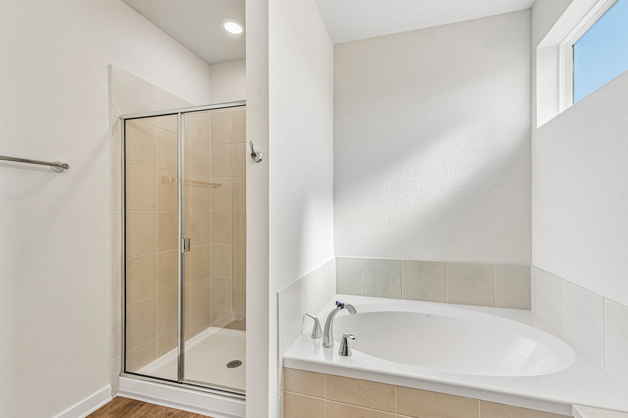 A bathroom with a glass shower.