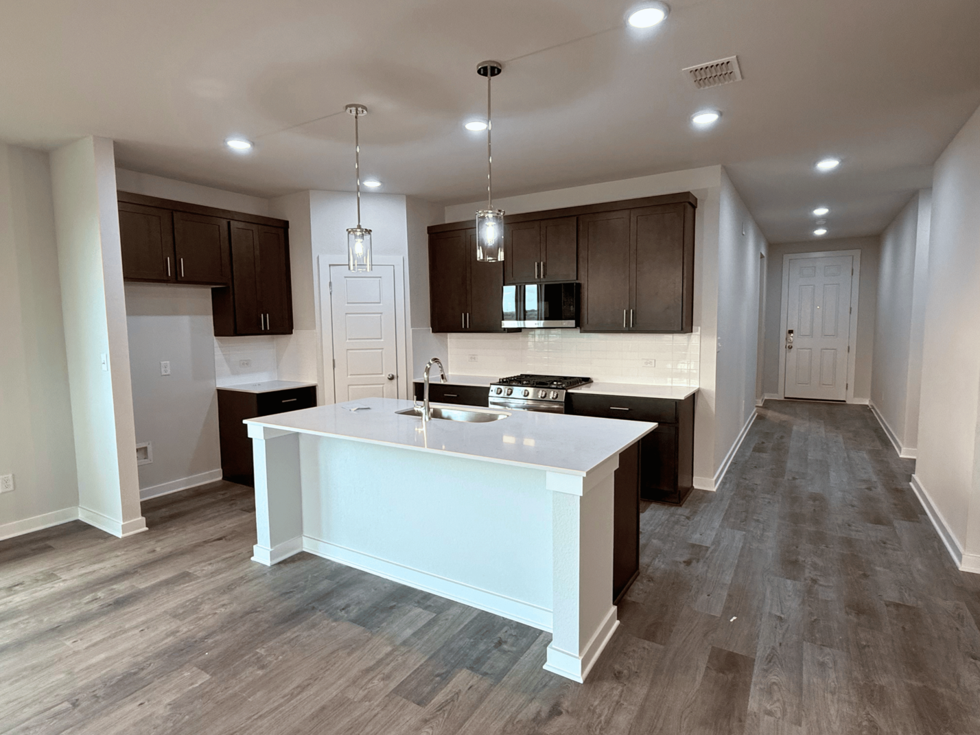 A kitchen with a large island.