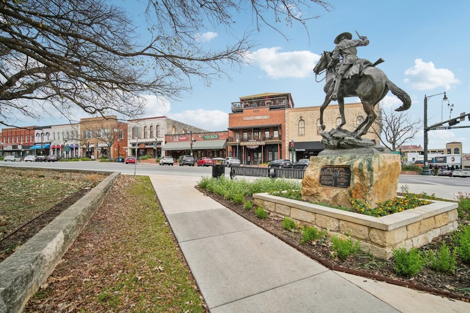 A statue of a person riding a horse.