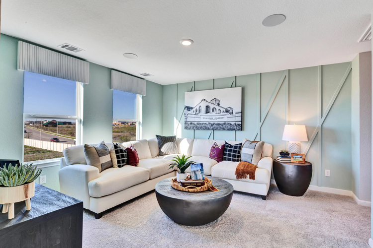 A living room with a large window.