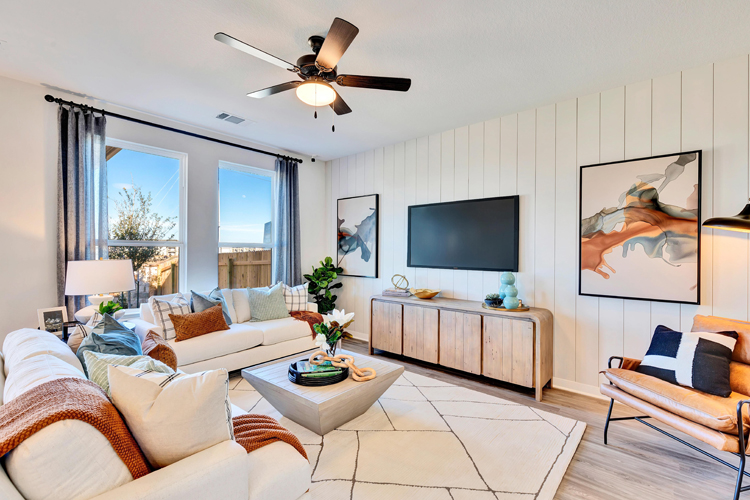 A living room with a tv and couches.
