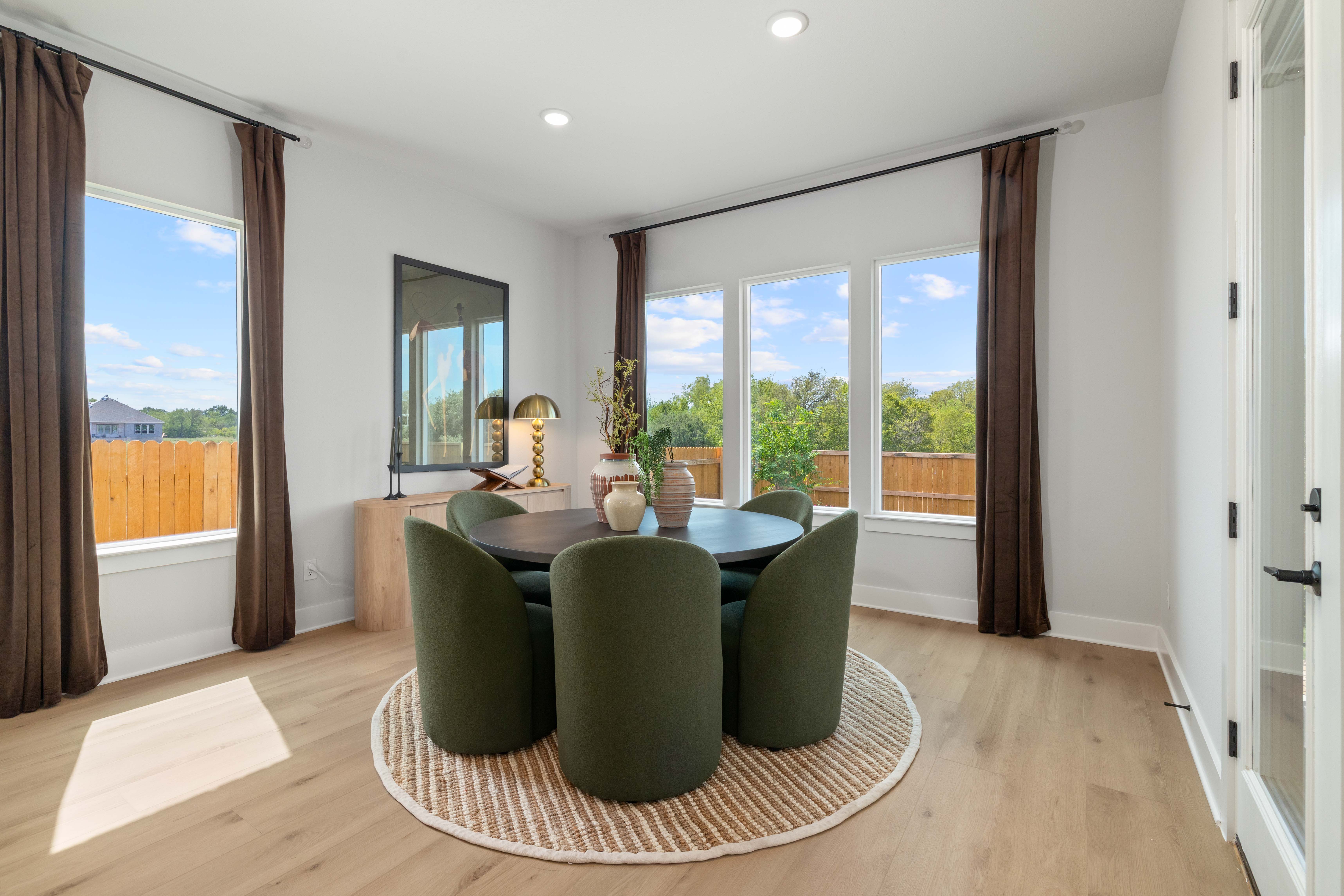 A living room with a large window.