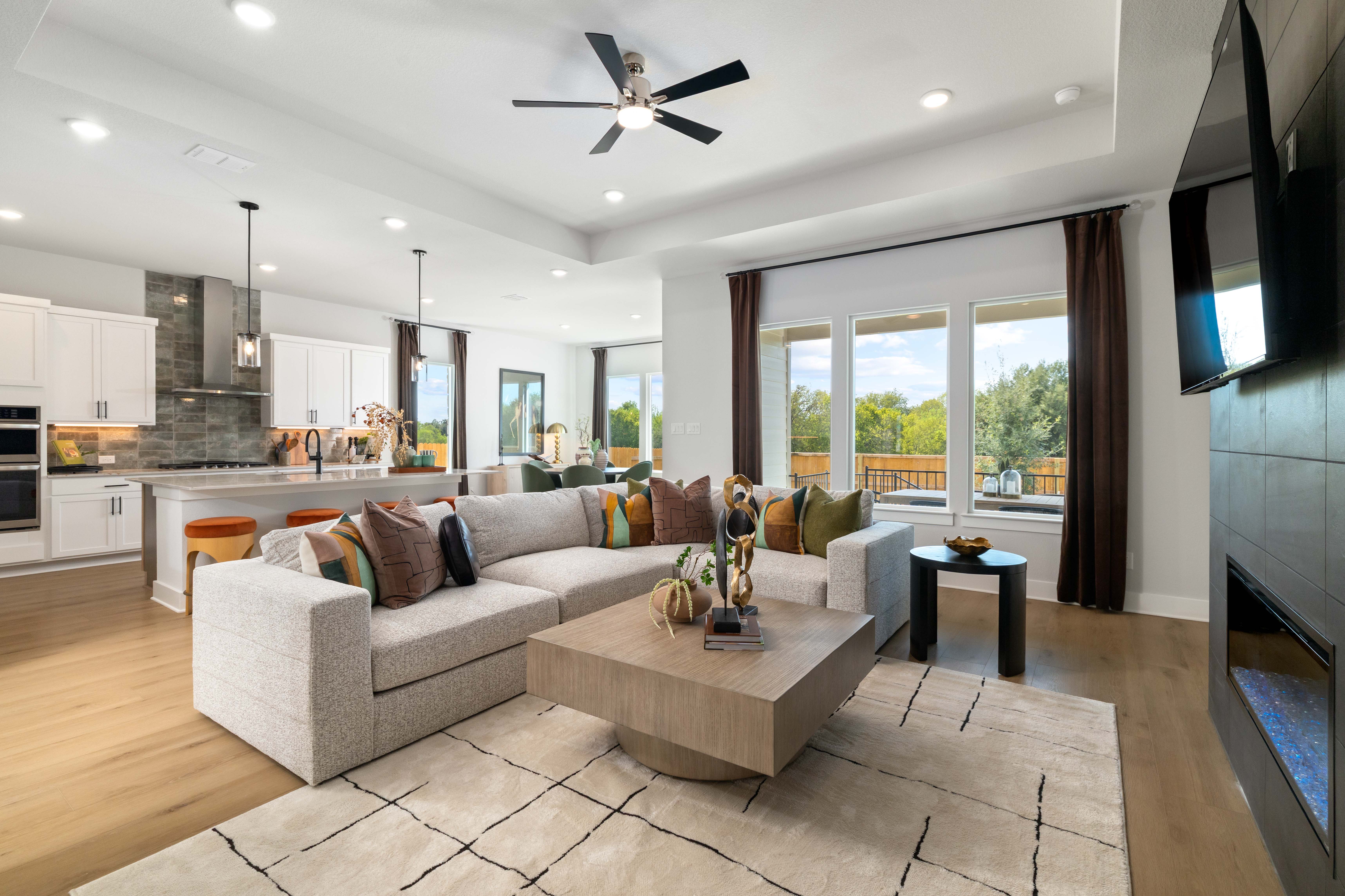 A living room with a large window.