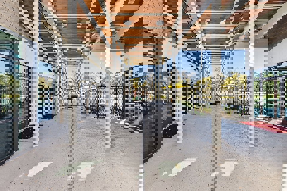 A building with a fence and a gate.