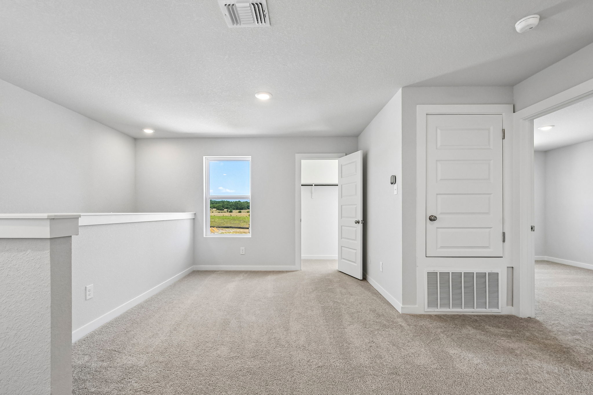 A room with white doors.