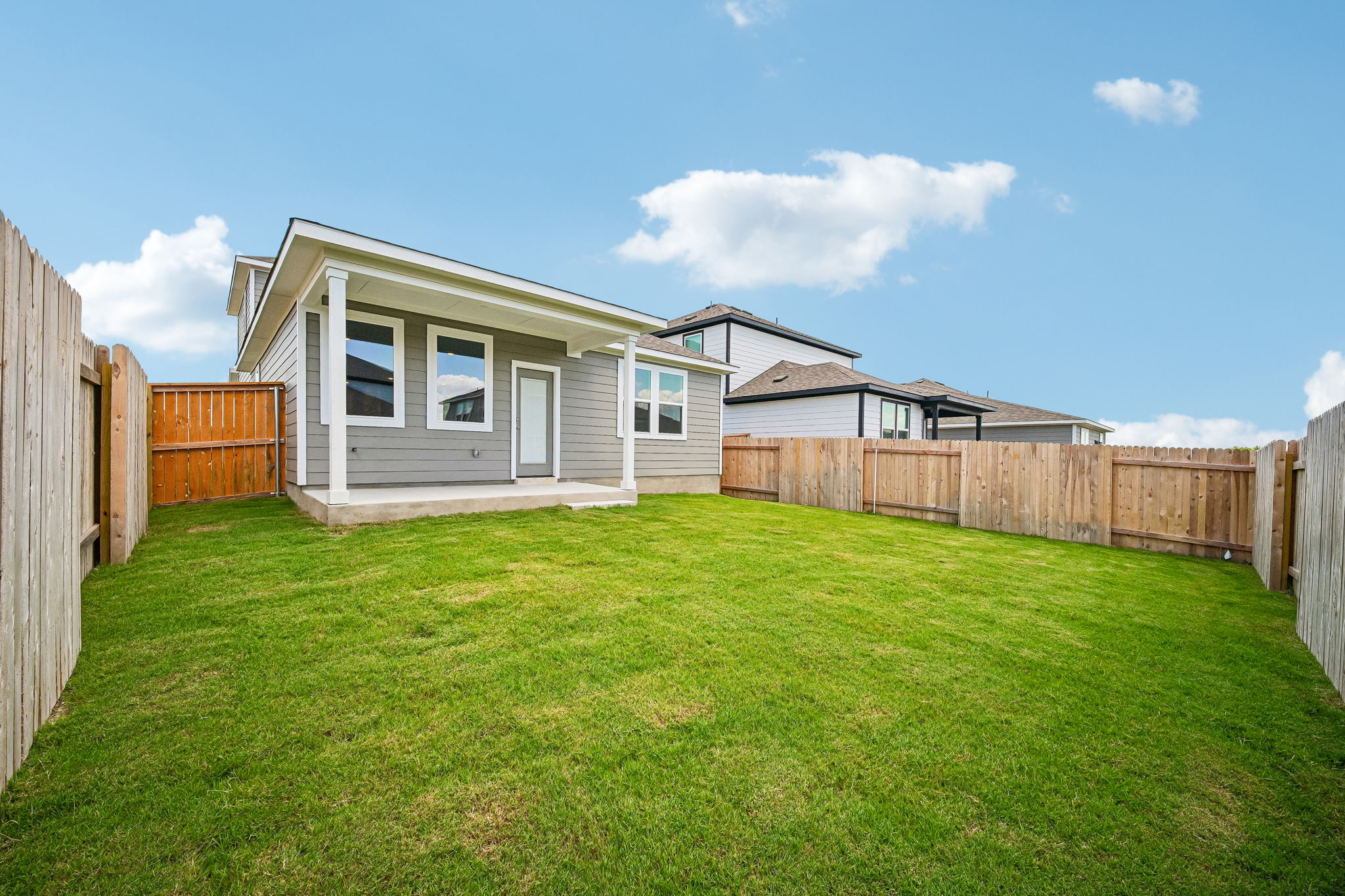 A house with a fence around it.