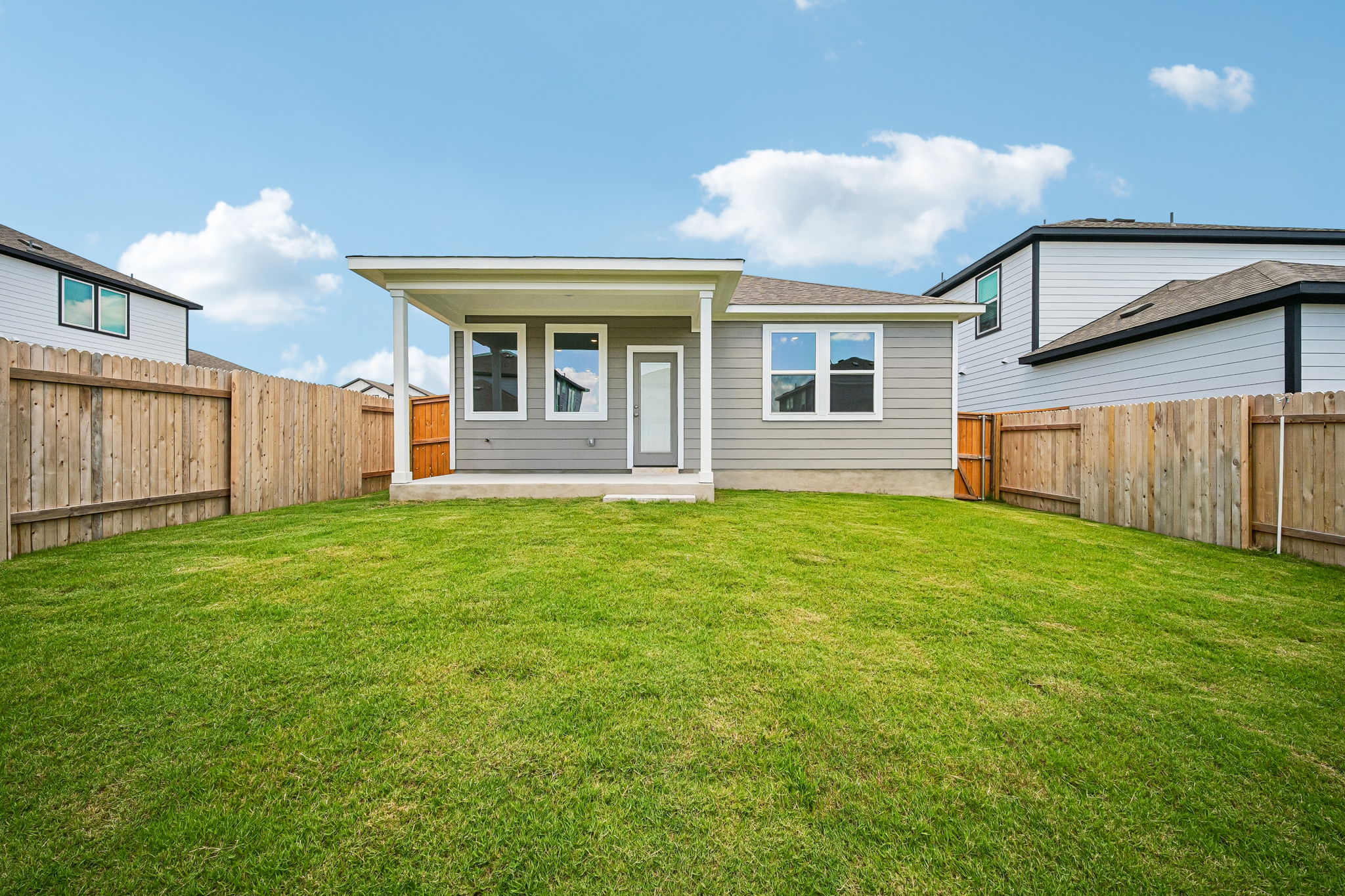 A house with a fence around it.