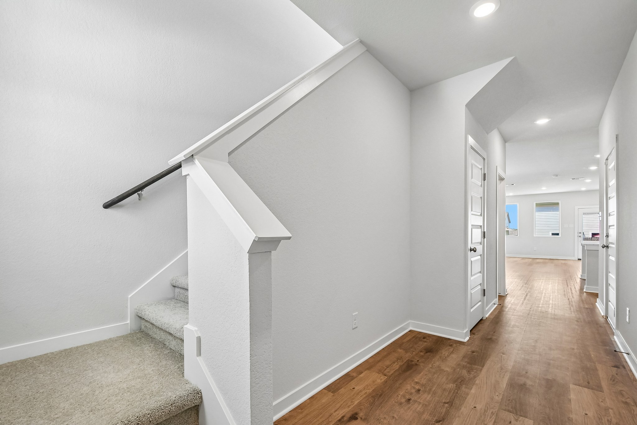 A white staircase in a house.
