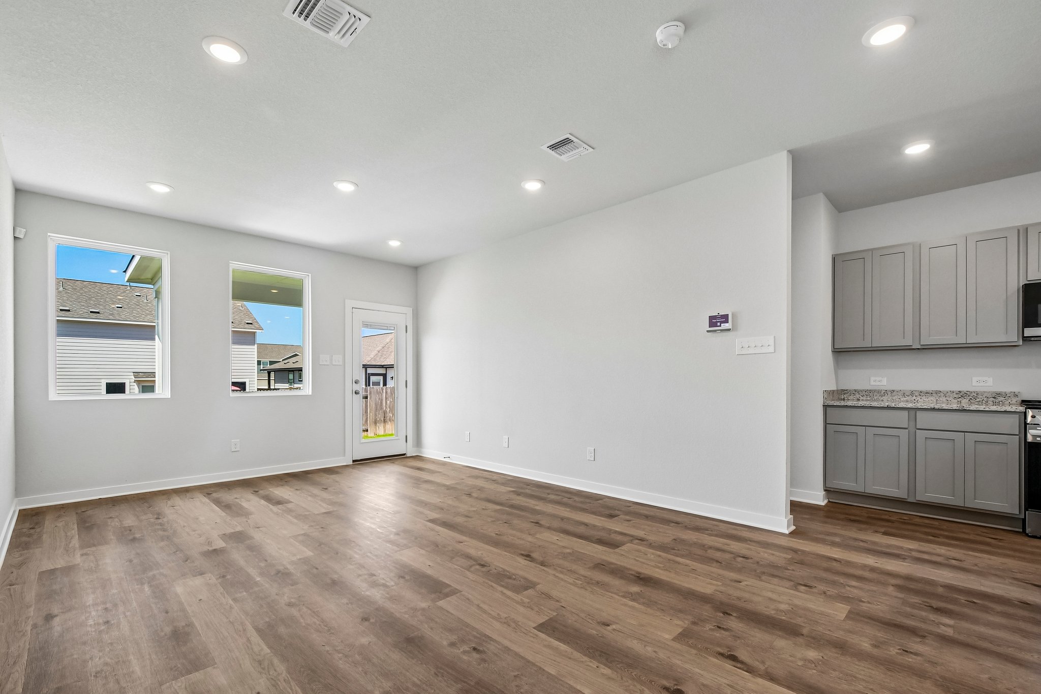 A large empty room with white walls.