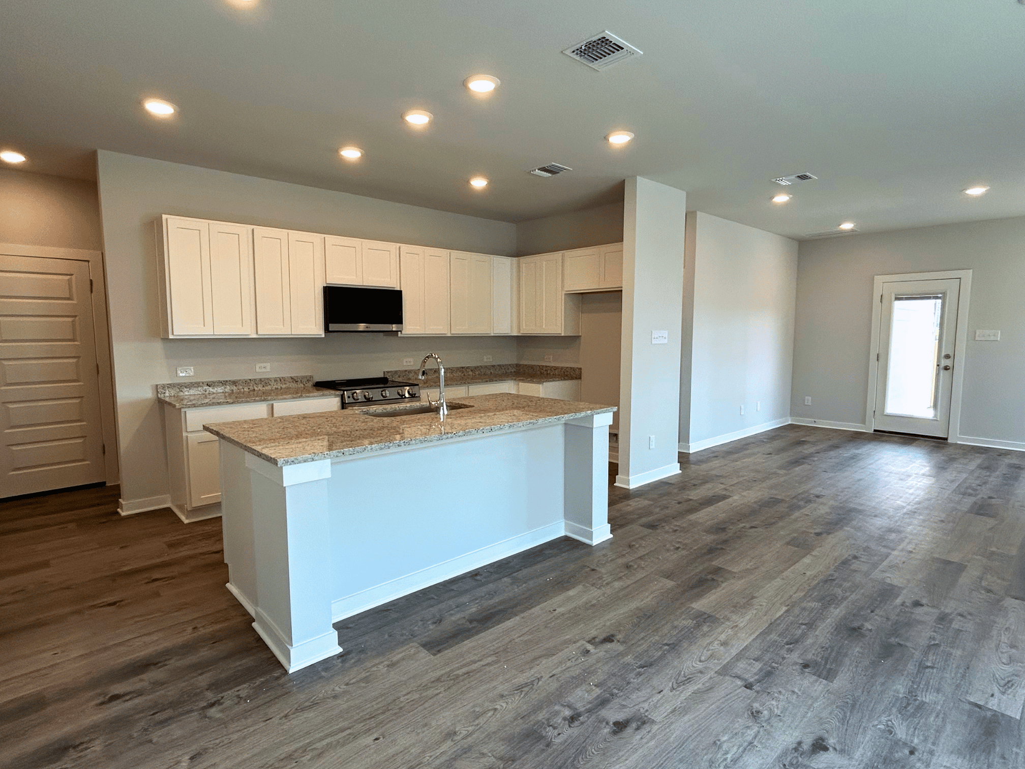 A kitchen with a large island.