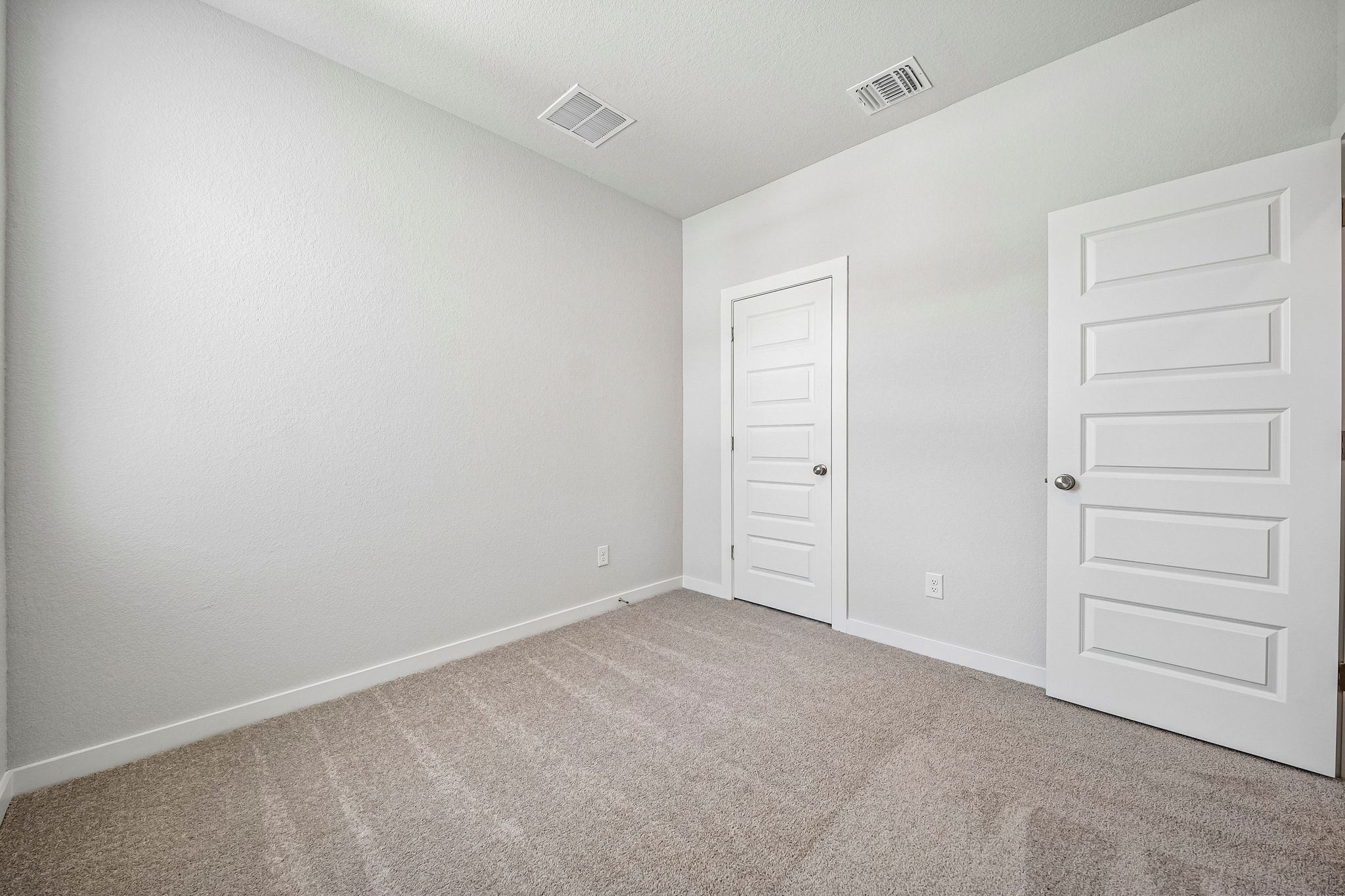 A room with white doors.