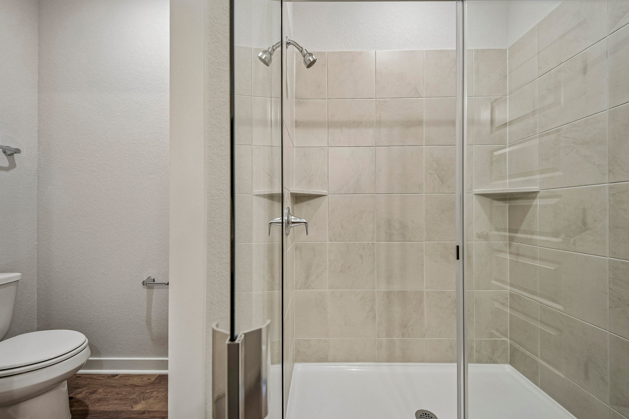 A bathroom with a glass shower.