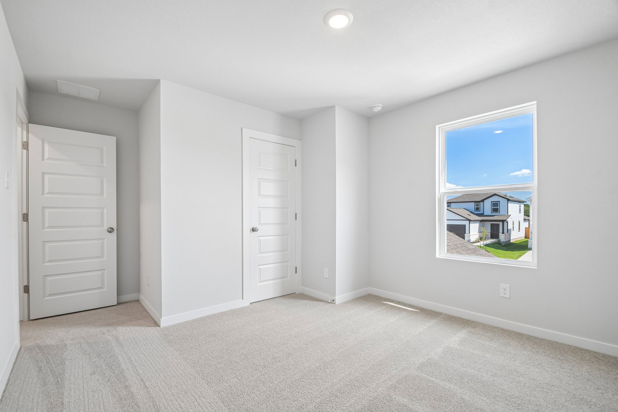 A room with white doors.