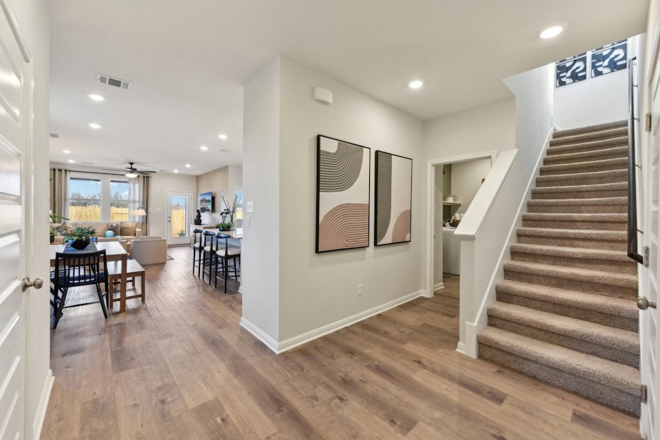 A large room with wood floors.
