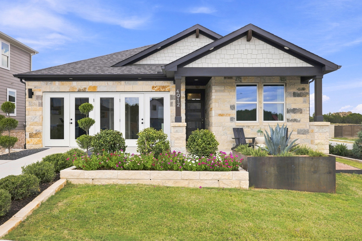 A house with a large front yard.